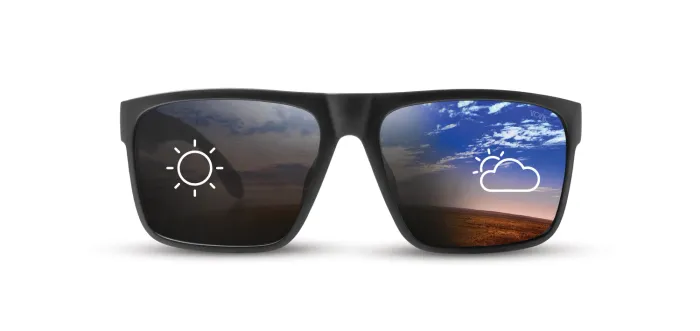 Tonic photochromic lens transitioning from light to dark