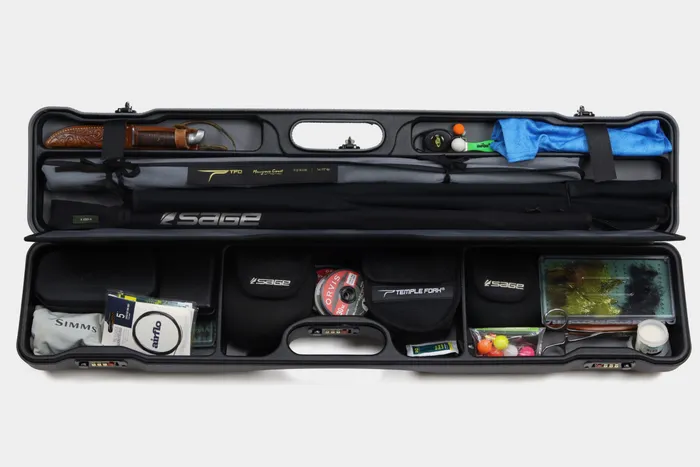 Sea Run Cases interior fully loaded with fly rods, reels, and accessories, organized and ready to travel